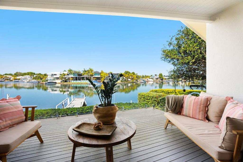 a living room with a view of the water at Townhouse 6 Sunseeker Close 26 in Noosaville