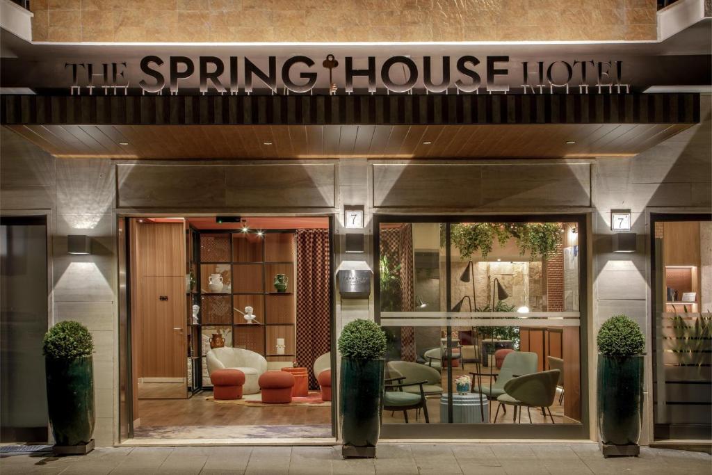 a entrance to the spring house hotel at The Spring House Hotel Rome Vatican, Tapestry Collection Hilton in Rome