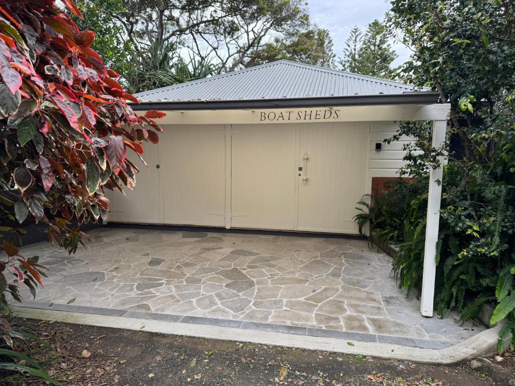 a garage with a sign that reads dont creep at Boatsheds in Sawtell