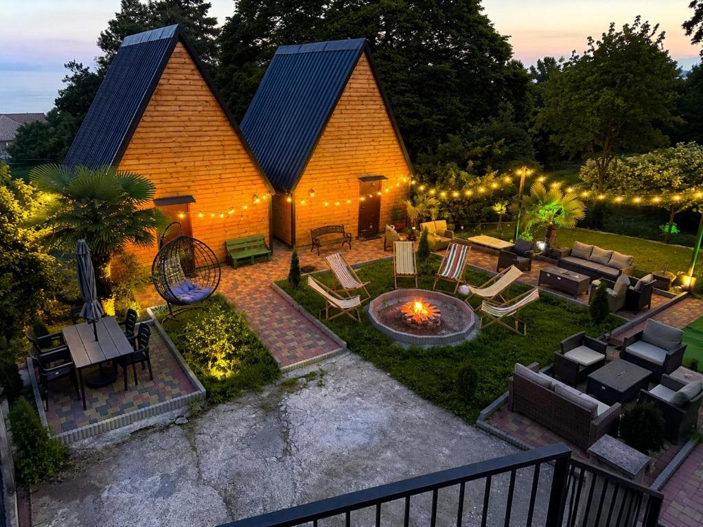 an aerial view of a backyard with a fire pit at SEA Side-მზის მხარე- N 1 in Makhinjauri
