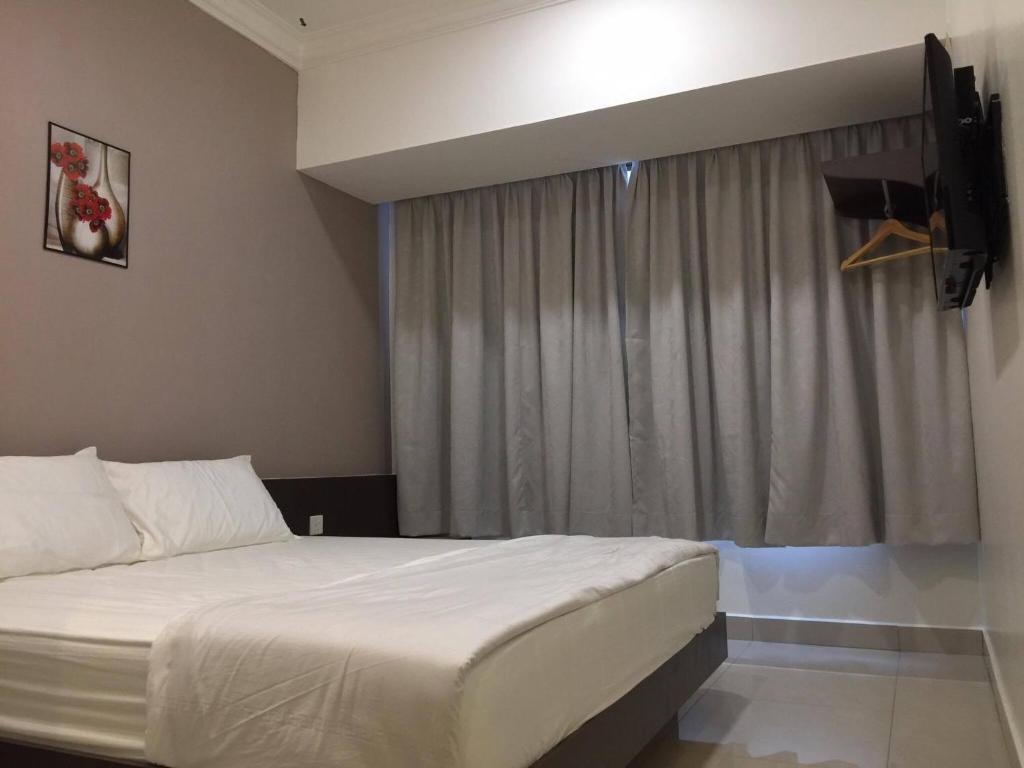 Postel nebo postele na pokoji v ubytování Hi Star Hotel