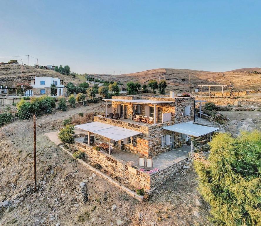 an overhead view of a house on a hill at The Traditional Stone Villa in Koundouros