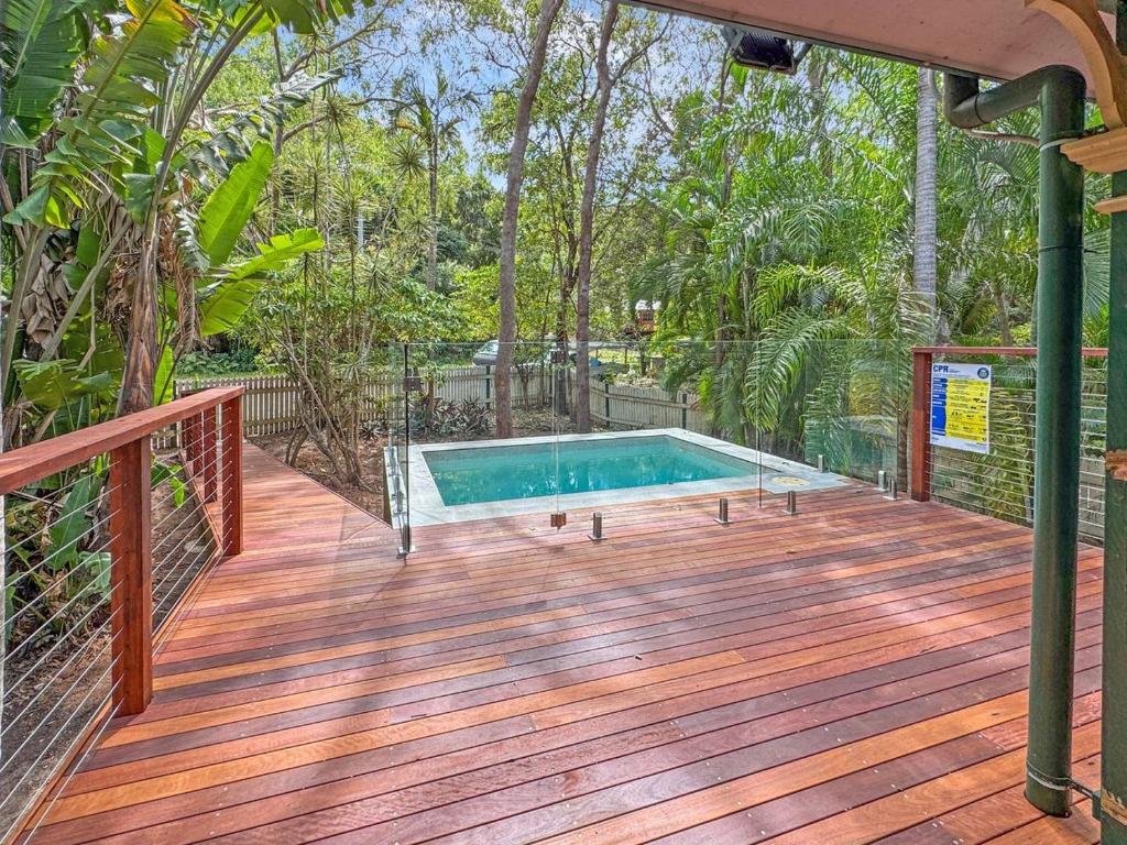 a deck with a swimming pool on top of it at Marramaninjie in Arcadia