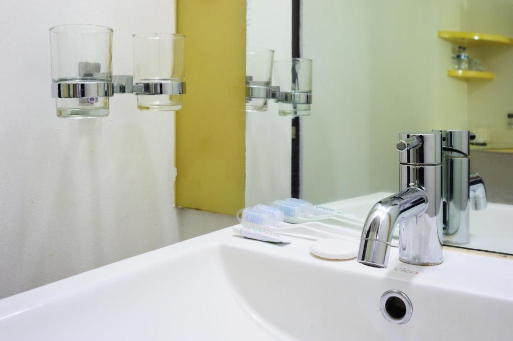 Koupelna v ubytování Amaris Hotel Padang