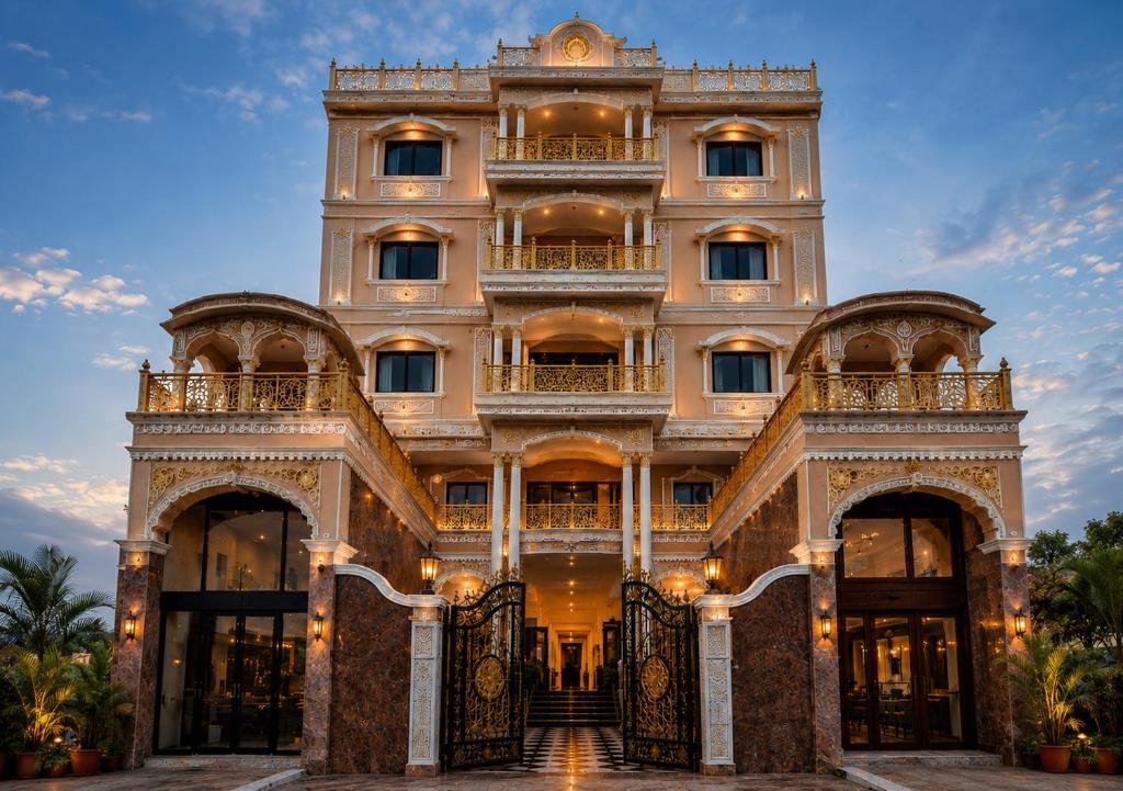 a large white building with two entrances at Hotel Singh Palace in Varanasi