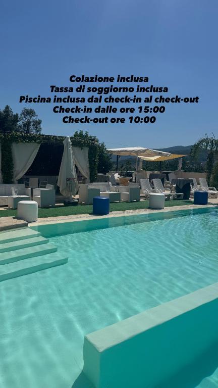 a picture of a swimming pool with a quote at L'oasi del Tuffatore in Agropoli