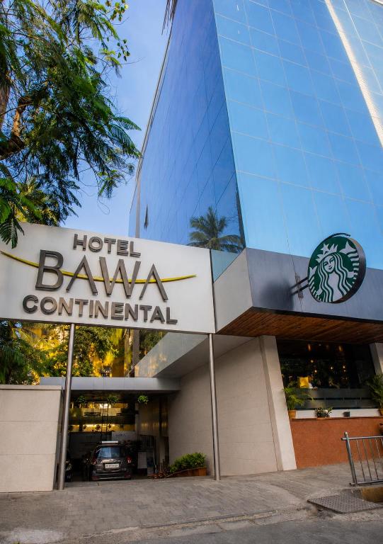 a hotel banquetential sign in front of a building at Hotel Bawa Continental Juhu Beach in Mumbai