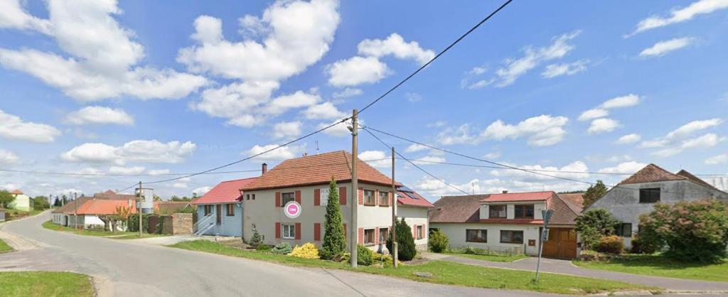 a house on the side of a street at Penzion U Bártů, Dešov in Desov