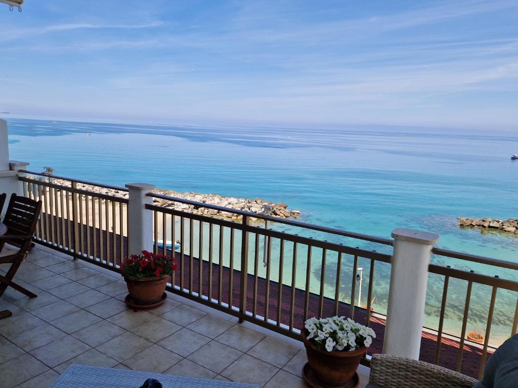 a view of the ocean from a balcony at Casa Alexandr Piedigrotta in Pizzo