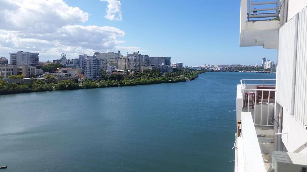 a view of a river from a building at Ritz Condo in San Juan