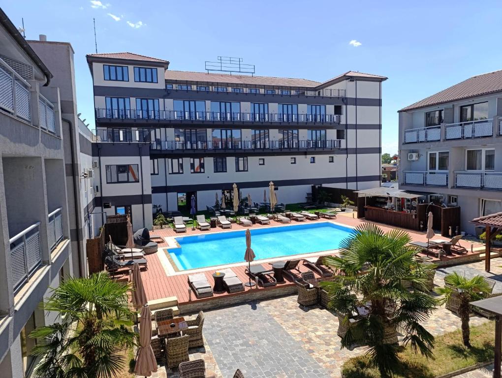 an aerial view of a hotel with a swimming pool at Hotel Sun in Senec
