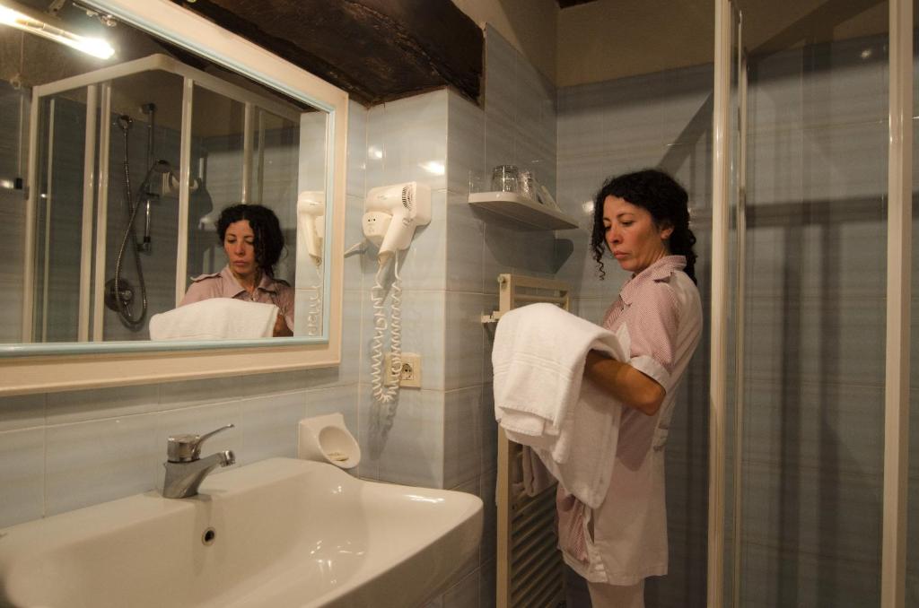 Koupelna v ubytování Hotel Belvedere Di San Leonino