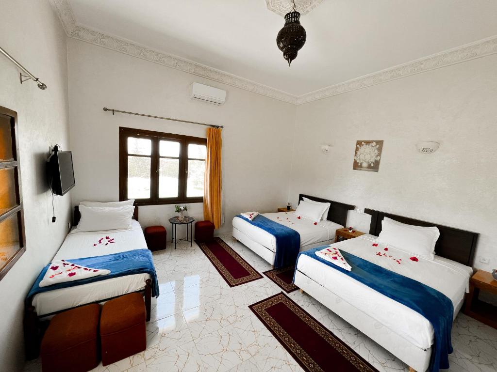 Guest House Qodwa - Vierpersoonskamer
