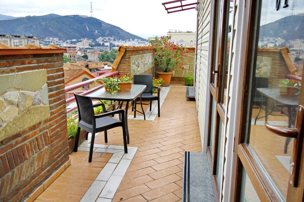 A balcony or terrace at Irmeni Hotel