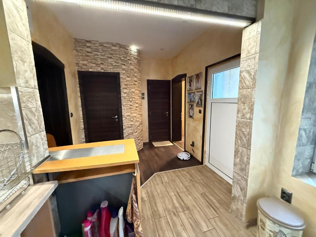 a kitchen with a sink and a counter top at Етаж от къща в Разград in Razgrad