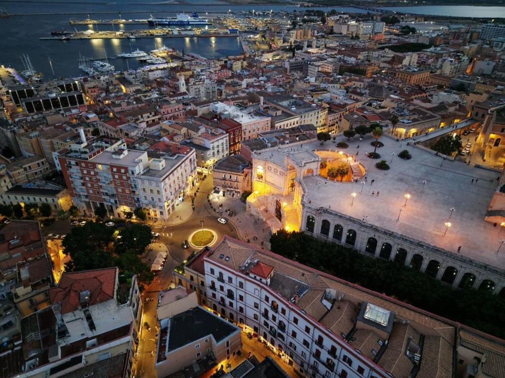 an aerial view of a city at night at Eva Luxury Saint Remy in Cagliari