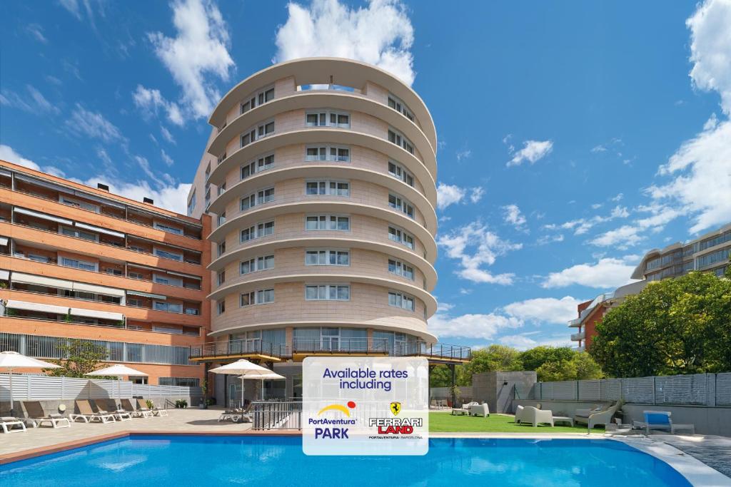 a hotel with a sign in front of a building at Ponient Vila Centric by PortAventura World - Available rates with tickets to PortAventura Park & Ferrari Land in Vilaseca de Solcina