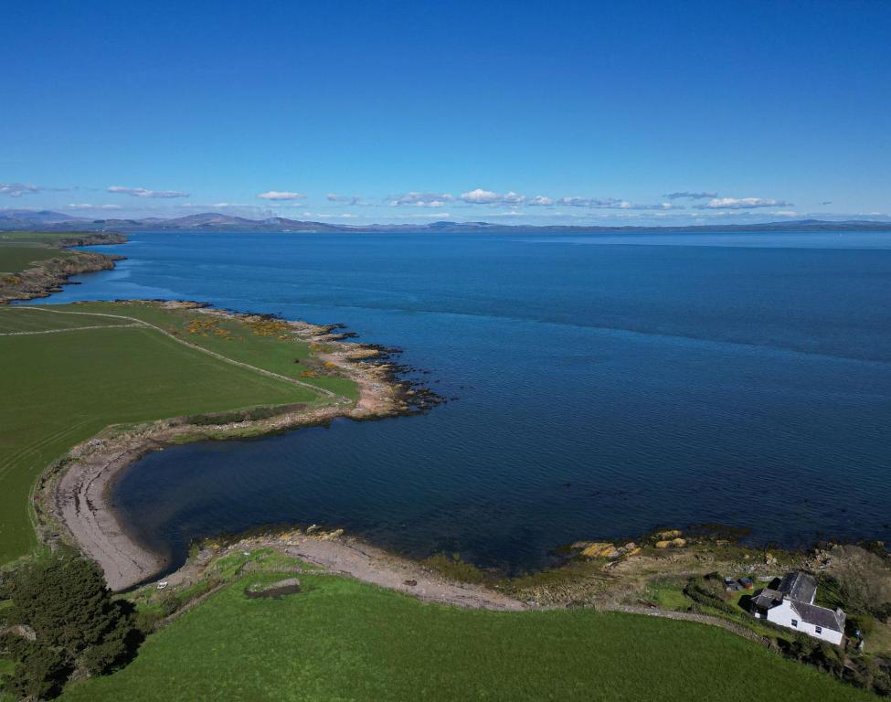 an aerial view of a large body of water at Shell Cottage in Whithorn