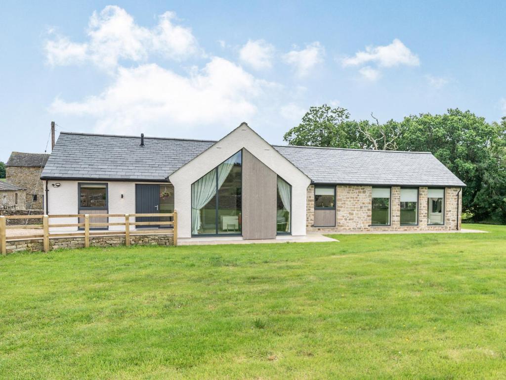 a house with a large yard in front of it at Uk34190 - Gowan View in Arkholme