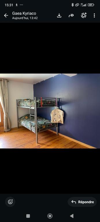 a picture of a bedroom with a bunk bed at Le Mazet in Nohèdes