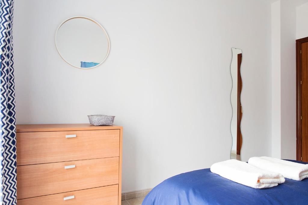 Posteľ alebo postele v izbe v ubytovaní Hello Málaga Flat Delicias