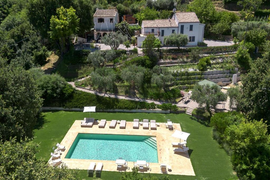an aerial view of a house with a swimming pool at Villa da Angelo by Mmega in Aquaviva Picena