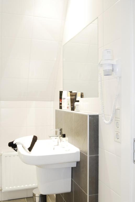Koupelna v ubytování Kodde Apartments