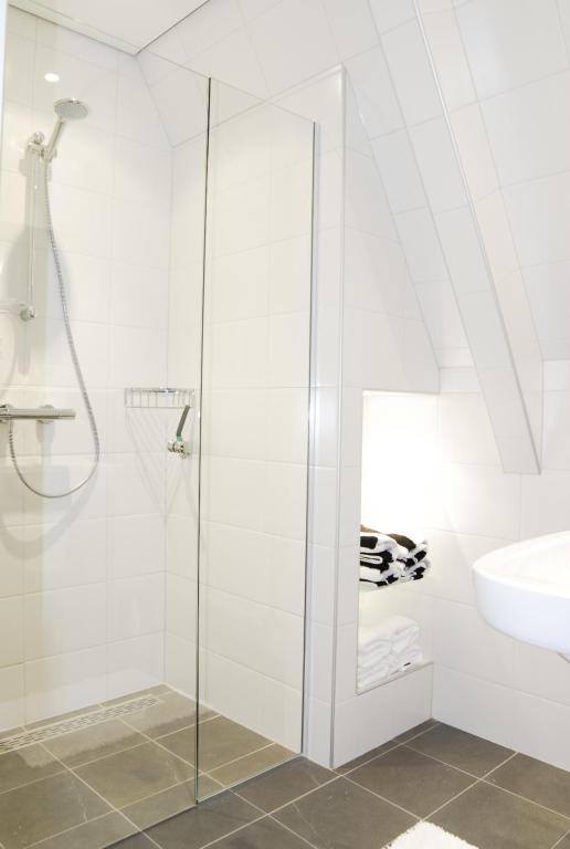 Koupelna v ubytování Kodde Apartments