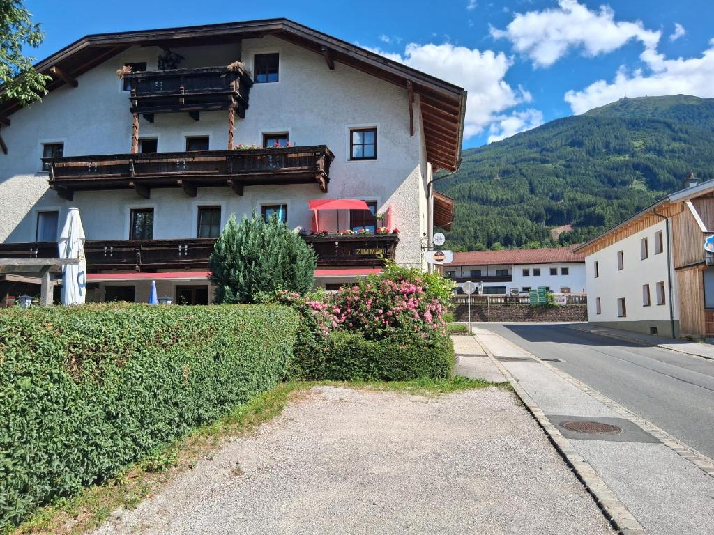 a building on the side of a street at Pension Post - Sistrans in Innsbruck