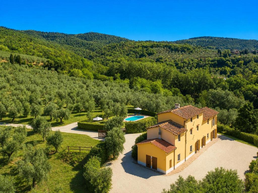 an aerial view of a house with a swimming pool at Villa Le Balze Large Private Pool WiFi in Florence