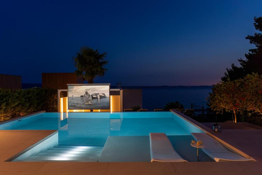 Seaview Villa ABA with 38sqm heated infinity pool, 4 bedrooms, Media room, 150m from sea