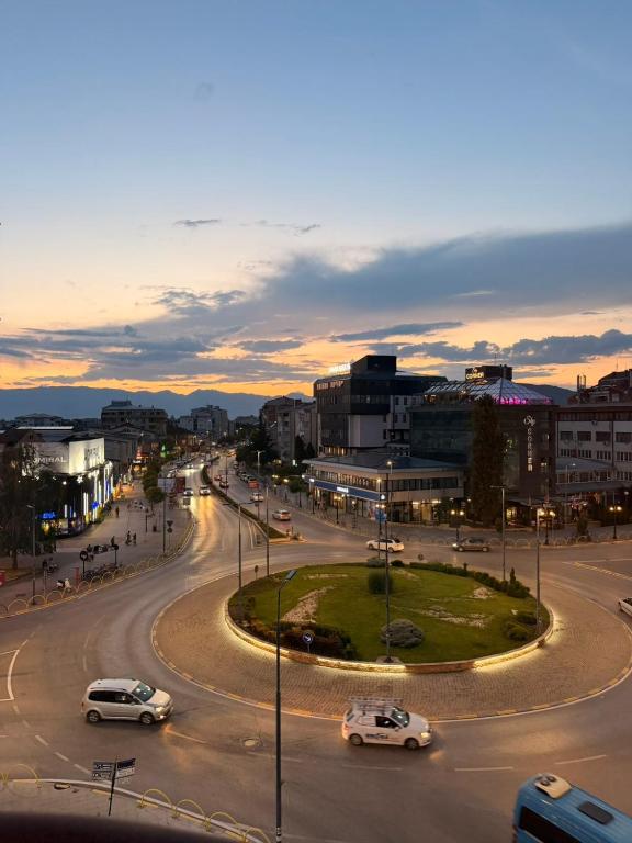 a city with cars driving on a street at Sofi Central Apartment in Ohrid