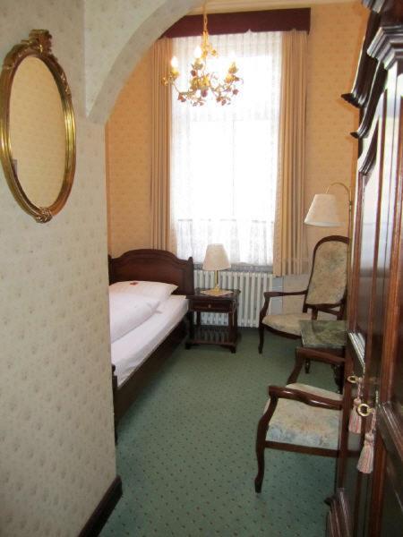 Postel nebo postele na pokoji v ubytování Hotel Stephan