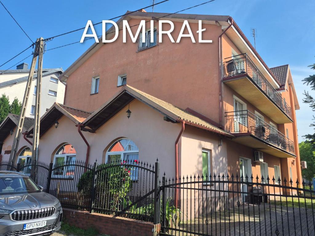 a building with a sign that reads abnormal at Bursztyn in Władysławowo