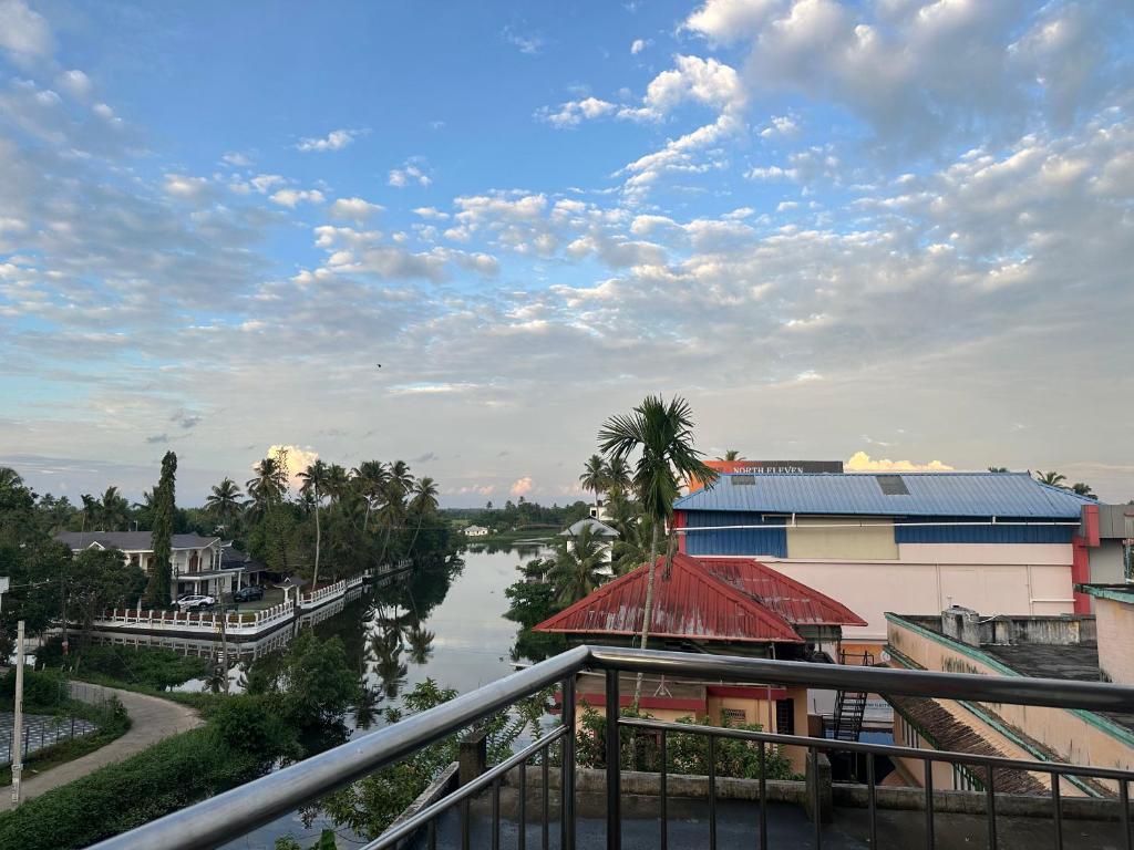 a view of a river from a balcony at Lilly Ribera in Kumarakom