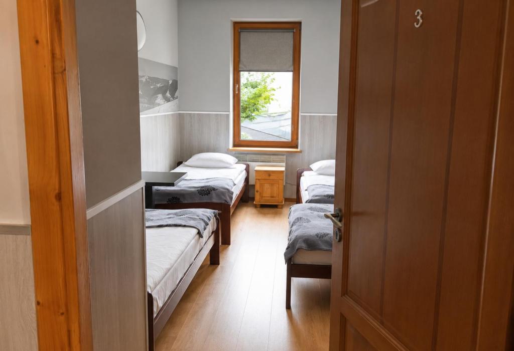 Top Hostel Pokoje Gościnne - Habitación Cuádruple Con Baño