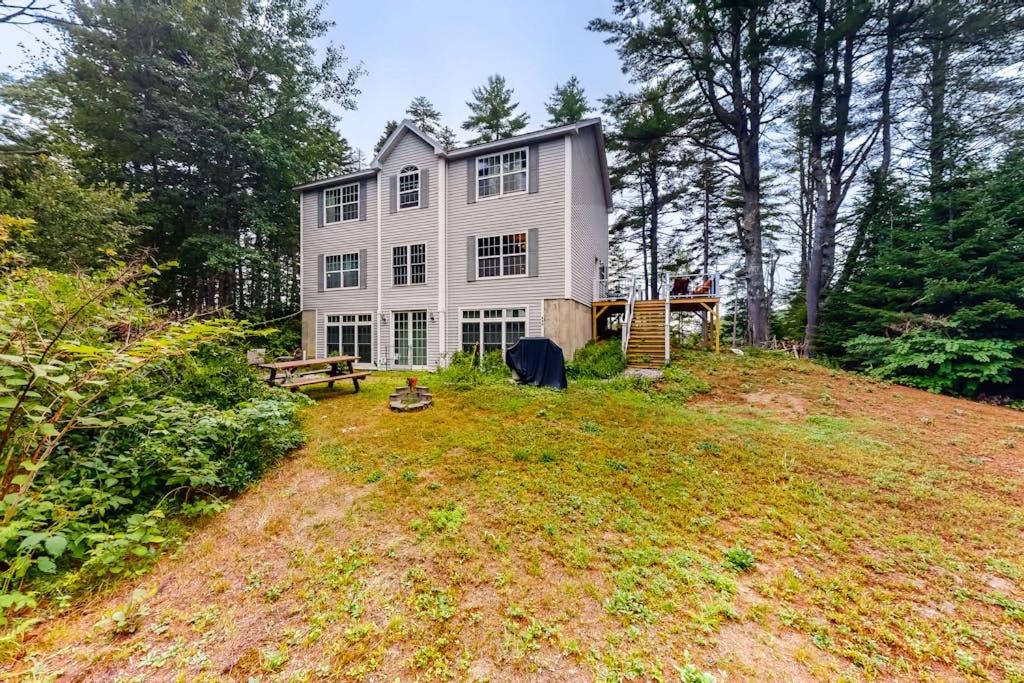 a large house on top of a hill at Idyllic waterfront home with furnished deck, grill, sweeping views & private W/D in Waldoboro