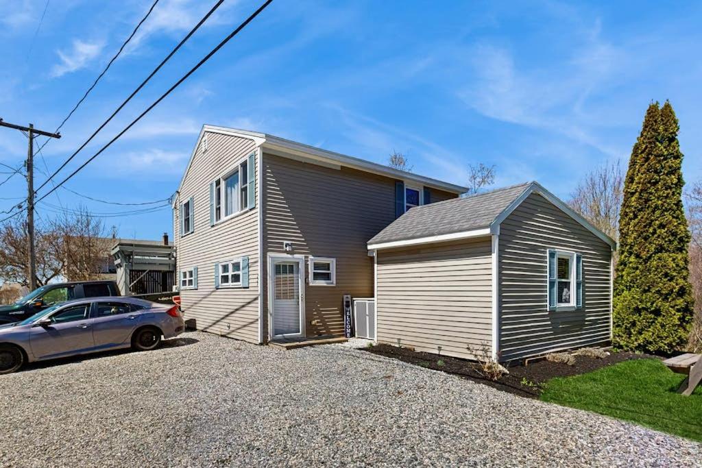 a house with a car parked in front of it at Well-located, dog-friendly home - walk to footbridge & Barrett Park in Boothbay Harbor