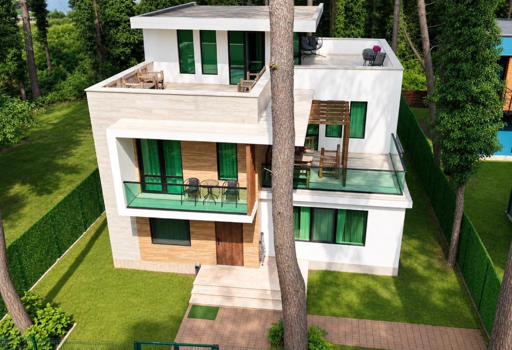 an aerial view of a house with a balcony at Pine Aparthotel in Shekhvetili