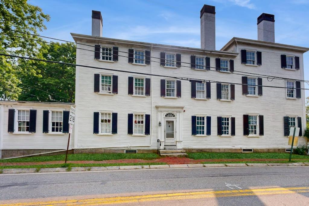 a white house with two chimneys on top of it at National Historic Landmark Home in Wiscasset Village w/ Complimentary Tour in Wiscasset