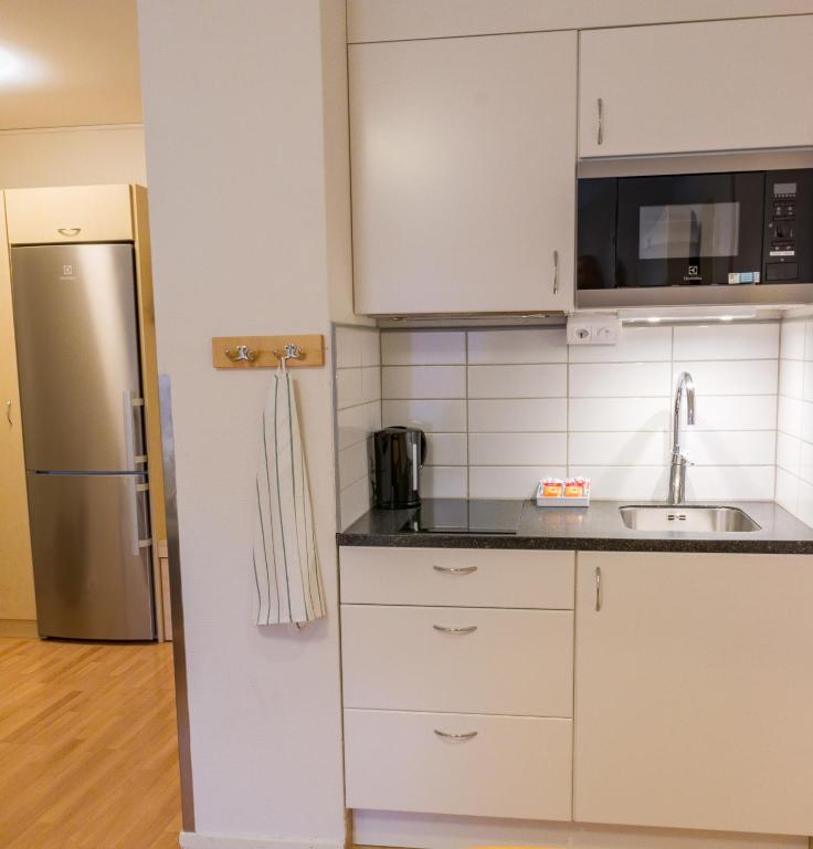 Kuchyň nebo kuchyňský kout v ubytování Linköpings Cityhotell och Vandrarhem