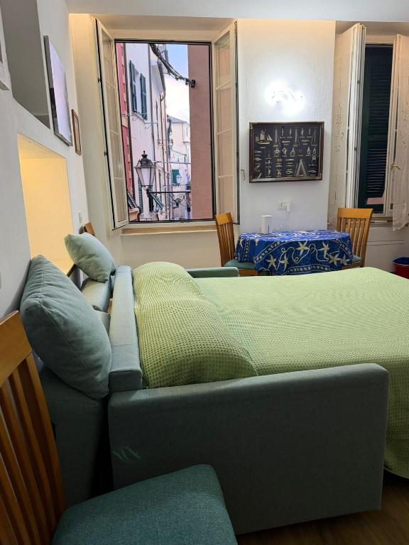 a living room with a couch and a table at Central Apartment Monterosso in Monterosso al Mare
