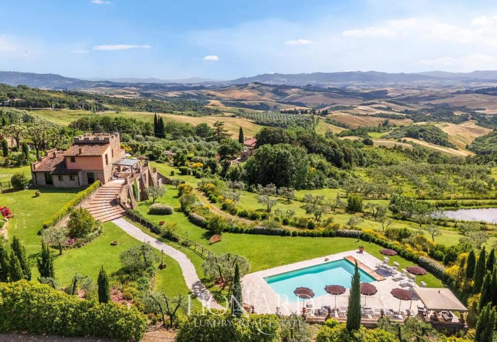 an aerial view of a estate with a swimming pool at La Vecchia Sassa in Montaione