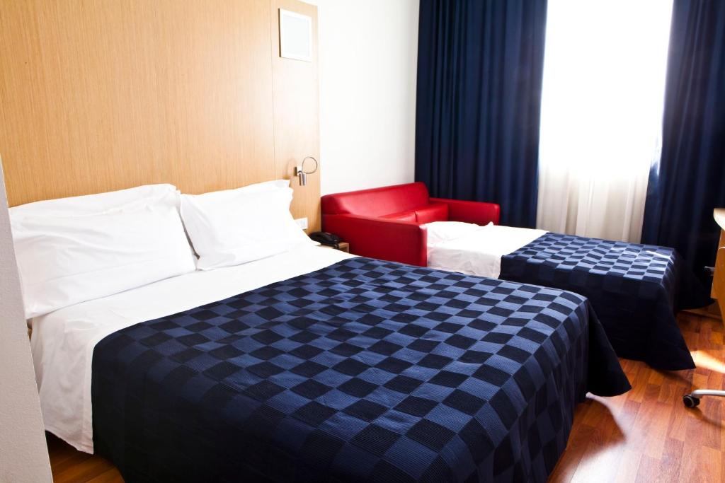 Posteľ alebo postele v izbe v ubytovaní Mitico Hotel & Natural Spa