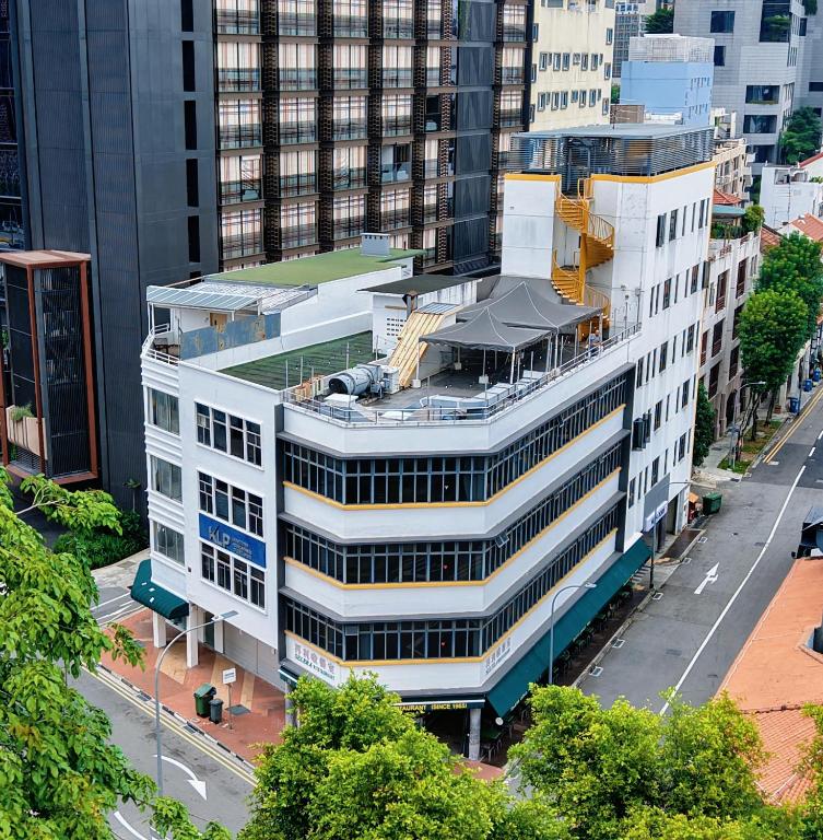 an overhead view of a building in a city at Aura Hotel Mackenzie in Singapore