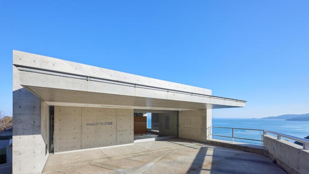 a building with a view of the ocean at TOTO Seawind Awaji in Awaji
