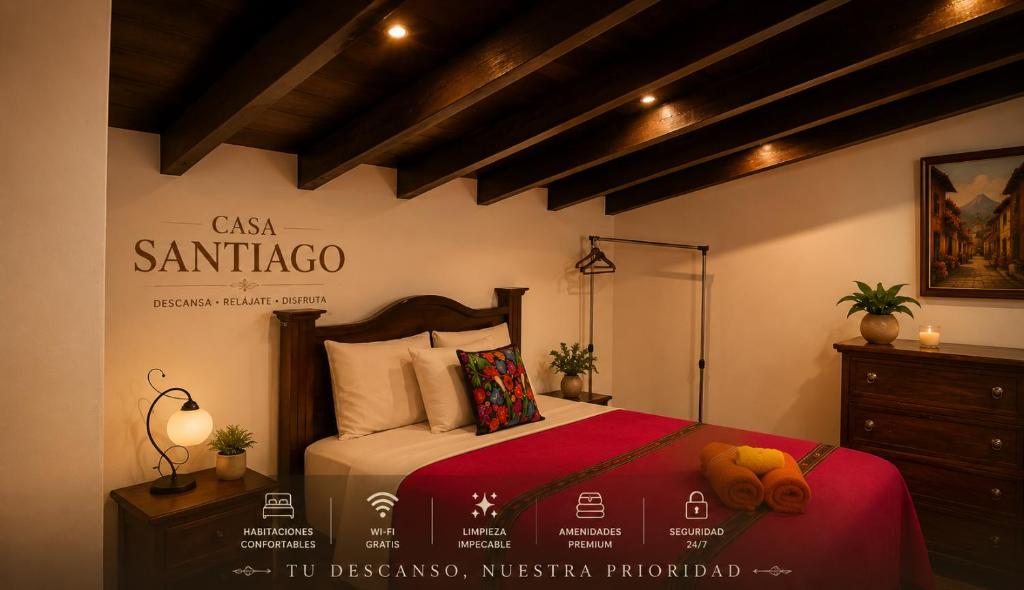 a bedroom with a bed and a sign on the wall at Casa Santiago Son 2 in Antigua Guatemala