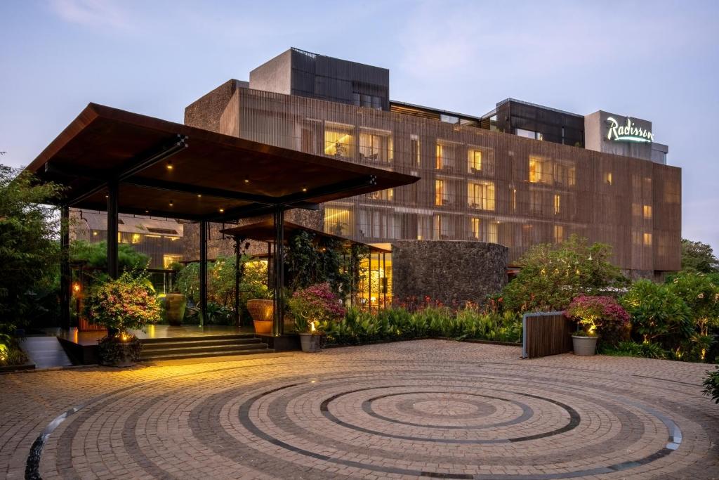 a building with a labyrinth in front of it at Radisson Resort and Spa Lonavala in Lonavala