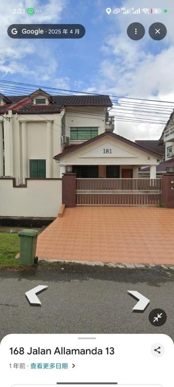 a picture of a house with two arrows pointing towards it at Stay181 Bintulu in Bintulu