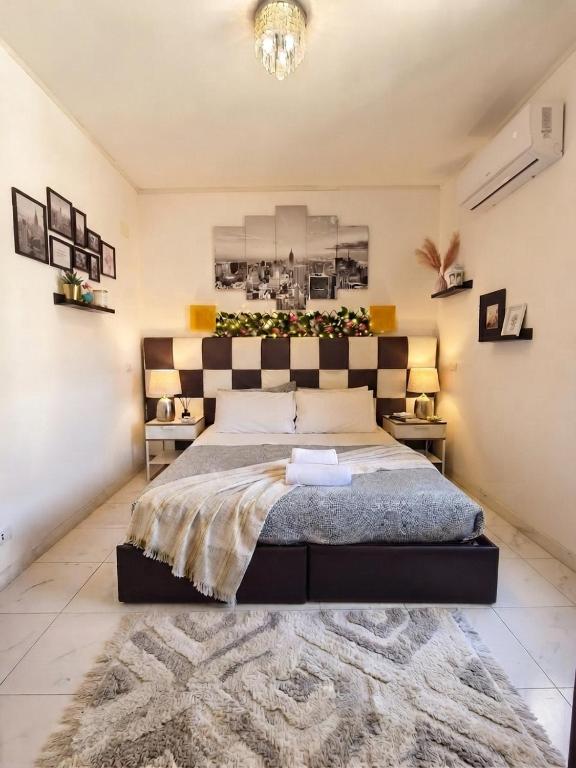 a bedroom with a large bed and a rug at Tra Terra e Laguna in Venice